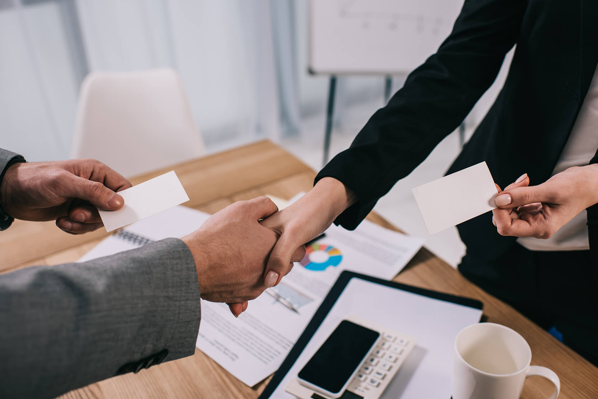 cropped-view-of-business-partners-shaking-hands-an-SUBGQMC.jpg